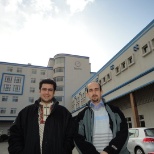 The left one is me standing in Elekta Campus with my colleague.