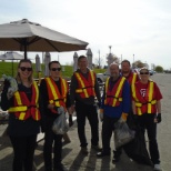 Staff collecting litter around the Head Office