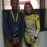 Here I am standing with Ms. Sprint cup, a reporter for the NASCAR Sprint cup races.