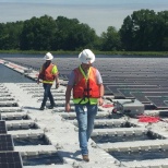 RETTEW’s President and CEO, Clayton Bubeck visiting the largest floating solar array. 