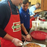 New field employees visit the home office in Nashville, TN for pizza training.