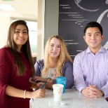 Dallas teammates chatting over coffee in our gorgeous RSM Dallas office.